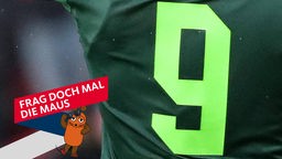 Grüne "9" als Rückennummer auf einem Fußballtrikot
