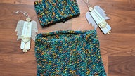 Gestricktes Set aus Stirnband und Loop