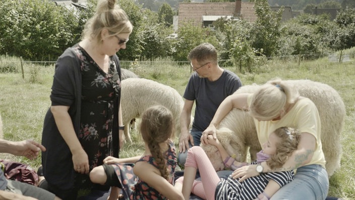 Familie mit Schafen