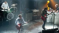 Die gesamte Besetzung der Noel Gallagher´s High Flying Birds stehen auf der Bühne