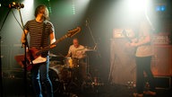 Bassist, Gitarrist und Drummer von "The Datsuns"