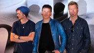 Popband a-ha auf einer Pressekonferenz 2015.