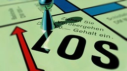 Monopoly Los-Feld mit Figur