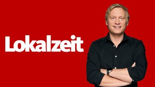 Marc Schulte (neben dem Lokalzeit-Logo)