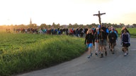 Die Kölner Kevelaer-Bruderschaft wandert einmal im Jahr 100 Kilometer nach Kevelaer