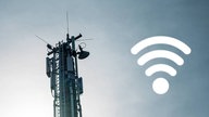 Mobilfunkmast mit WLAN-Zeichen daneben