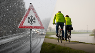 Verkehrszeichen Schnee- oder Eisglätte und zwei Radfahrer auf dem Weser-Radweg.