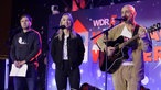 Die "Ampel WG" auf der Bühne des WDR 2 Weihnachtswunders (v.l.): Tobias Brodowy (Lindi, Habecki), Jacky Feldmann (Baerbocki), Uli Winters (Lauti, Scholzi)