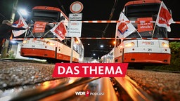 Straßenbahnen stehen vor einem Depot der Dortmunder Verkehrsbetriebe