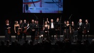 Das Ensemble im Kulturzentrum: Leonardo Cortellazzi (Tenor), Francesca Aspromonte (Sopran), Chiara Brunello (Contralto), Mauro Borgioni (Bass) & Boris Begelman (Leitung, Violine)