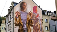 Wandgemälde vom australischen Straßenkünstler Fintan Magee