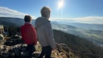 Am Gipfelkreuz vom Feldberg