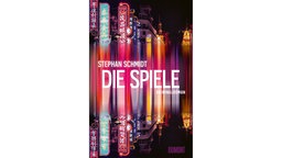 Das Buchcover zu Stephan Schmidts "Die Spiele" zeigt asiatische Leuchtreklame.