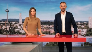 Catherine Vogel und Michael Dietz im Studio der Sendung "Aktuelle Stunde"